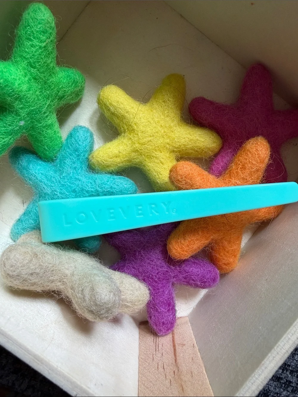Lovevery felt stars and tweezers